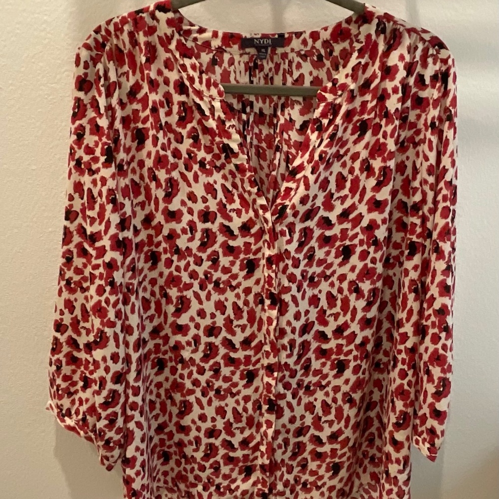 Red and black animal print blouse